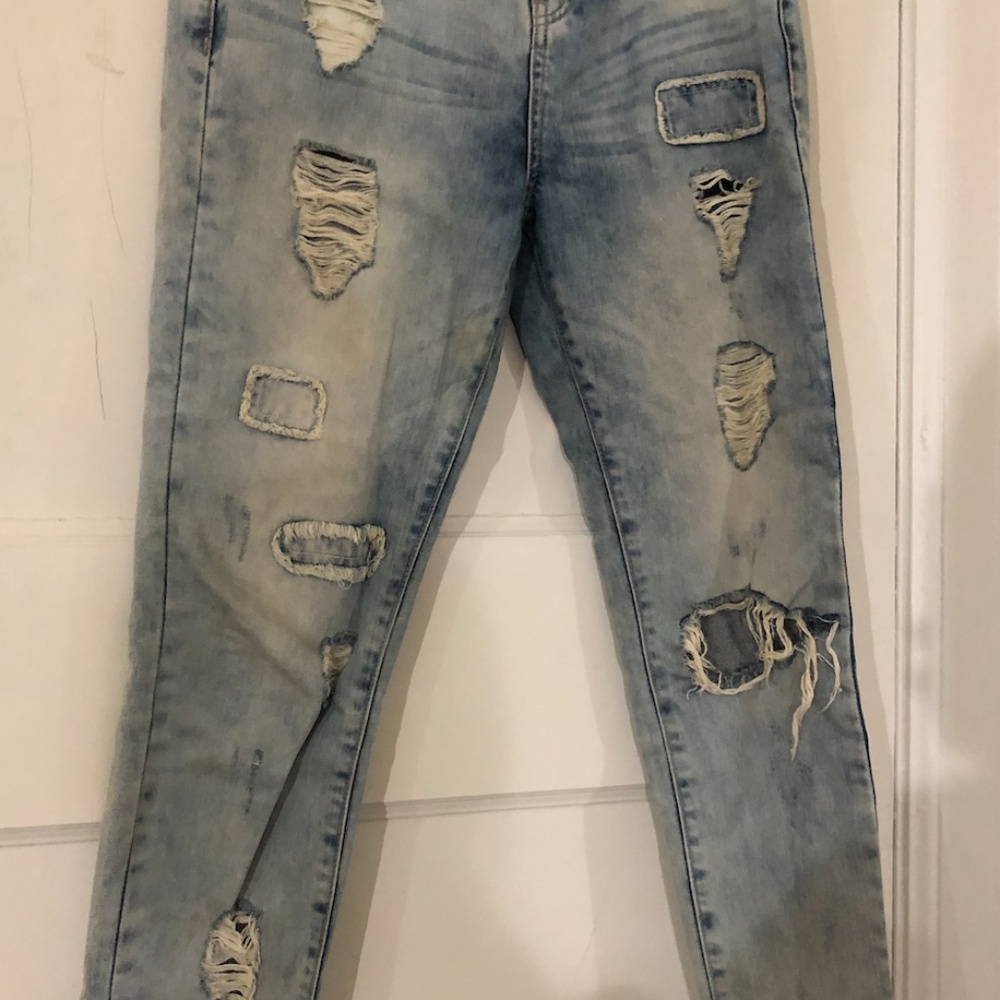 Light Blue Jeans with holes